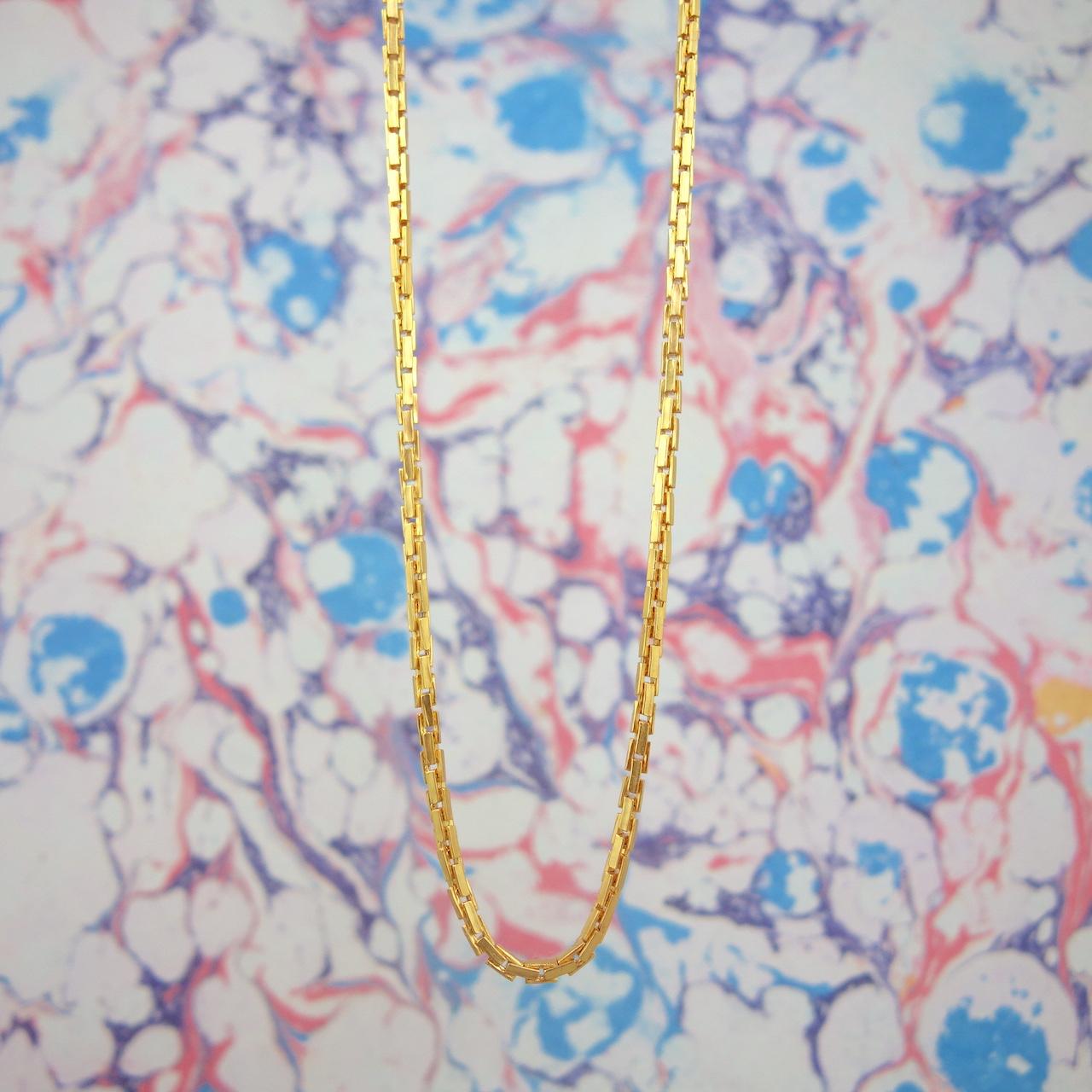 long_collier_sautoir_rebecca_roulotte_chaine_serpent_esprit_vintage_intemporel_laiton_dore_or_fin.